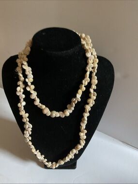 Tiny shell necklace.   18 inches